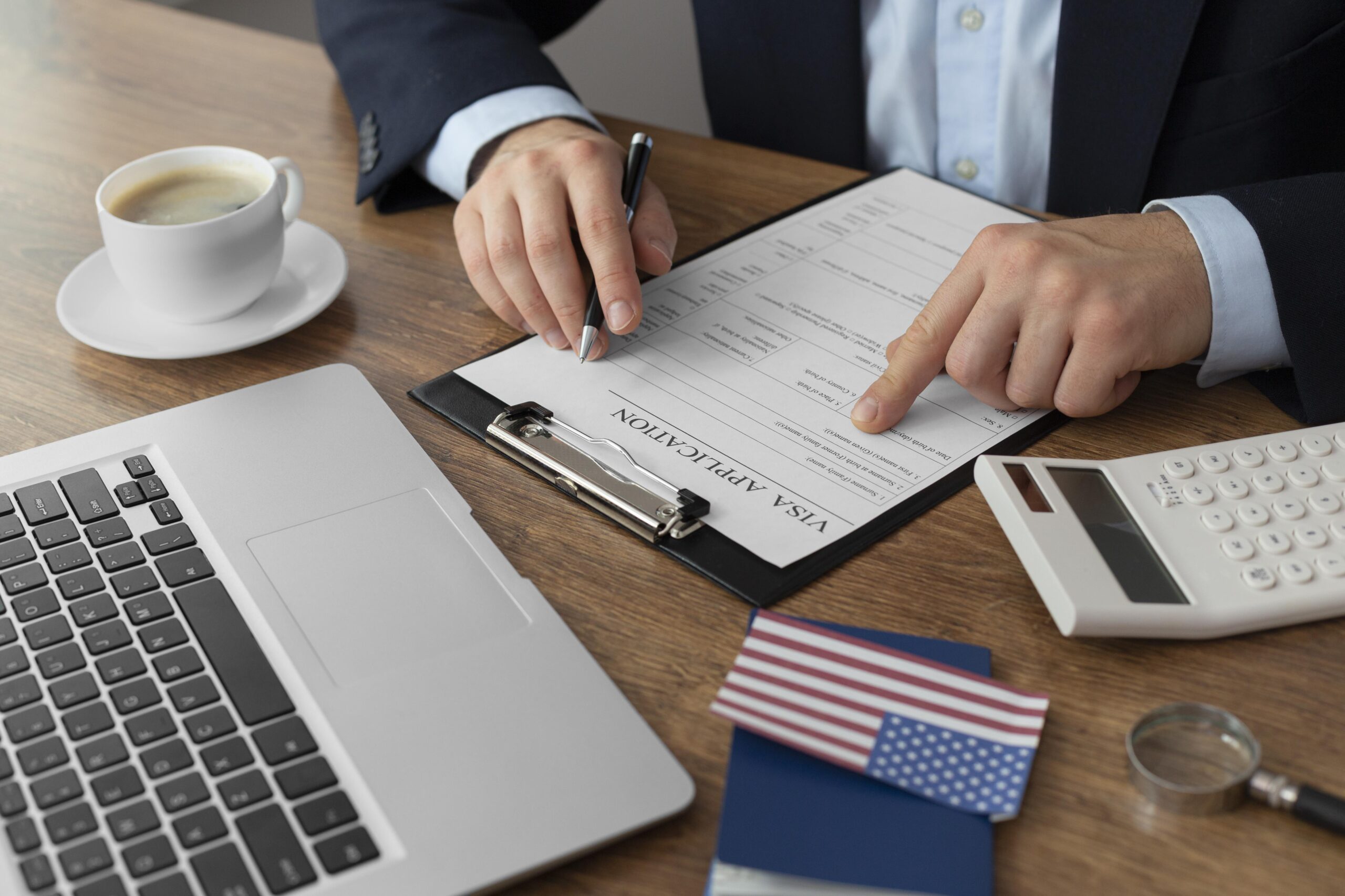 visa-application-composition-with-american-flag (1)